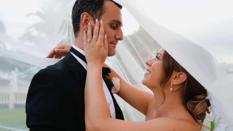 Girl with black travel backpack in greenery
