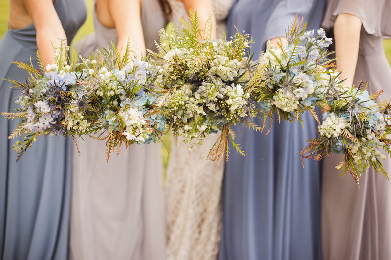bridal party holding bouquets during bridals