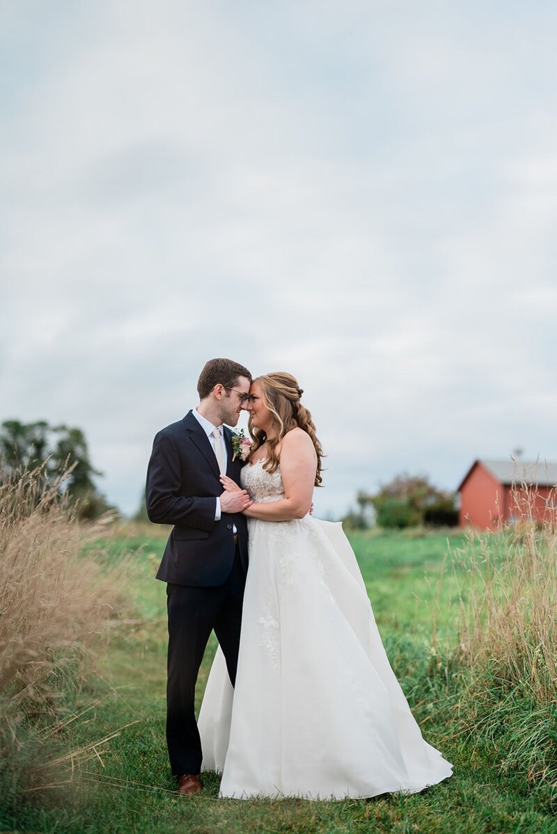 Bride and groom embracing each other