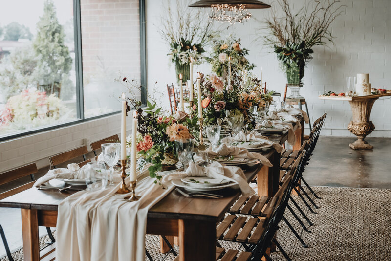 Wedding details  of tablescape with florads and candles.