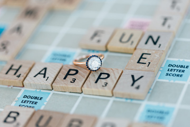 Scrabble game with engagement ring