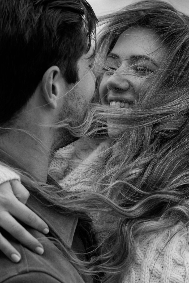 couple laughing on beach