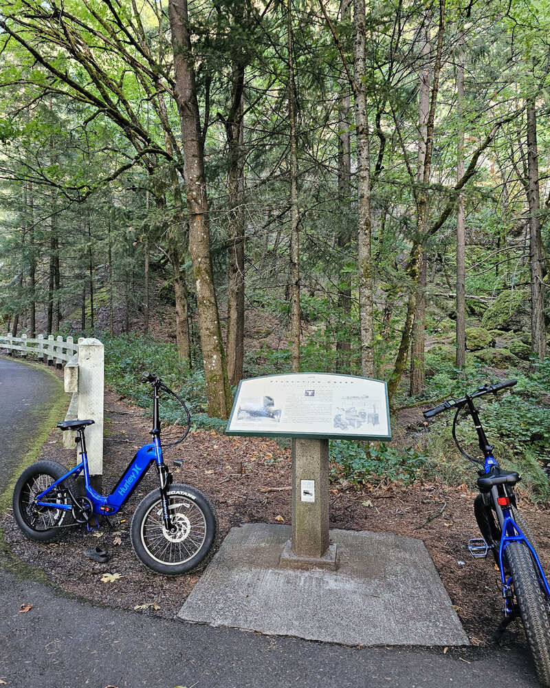 Learn about different trail sections with informative signs while biking through Viento State Park with The Gorge E-Bike Adventure Rentals