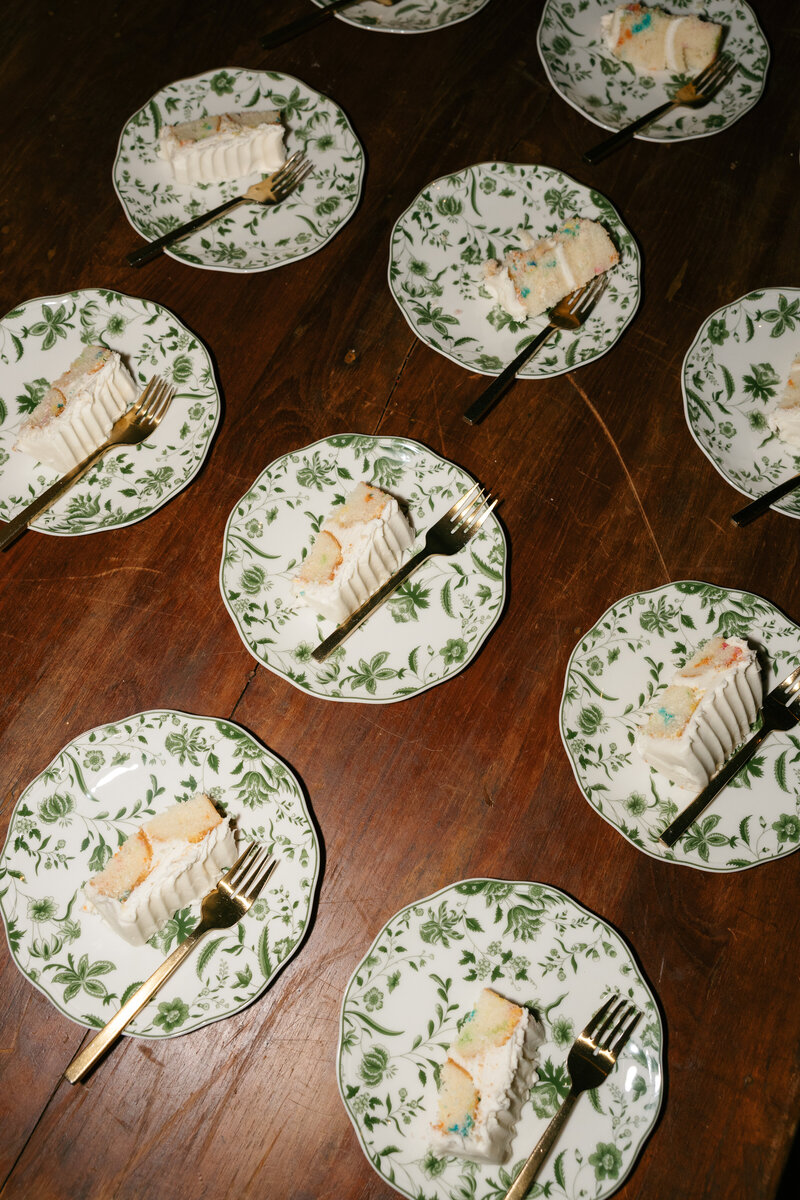 Flash photo of wedding cake on china plates at Nashville wedding