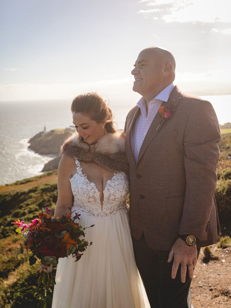 Bride and groom at Howth Cliff Walk for their micro wedding  in Dublin, Ireland