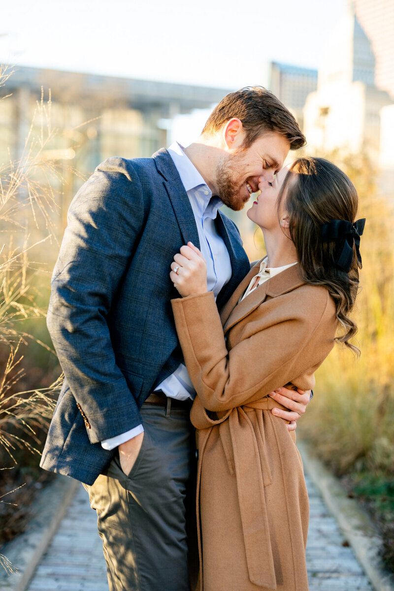 A winter engagement photo taken in Lurie Garden in Downtown Chicago
