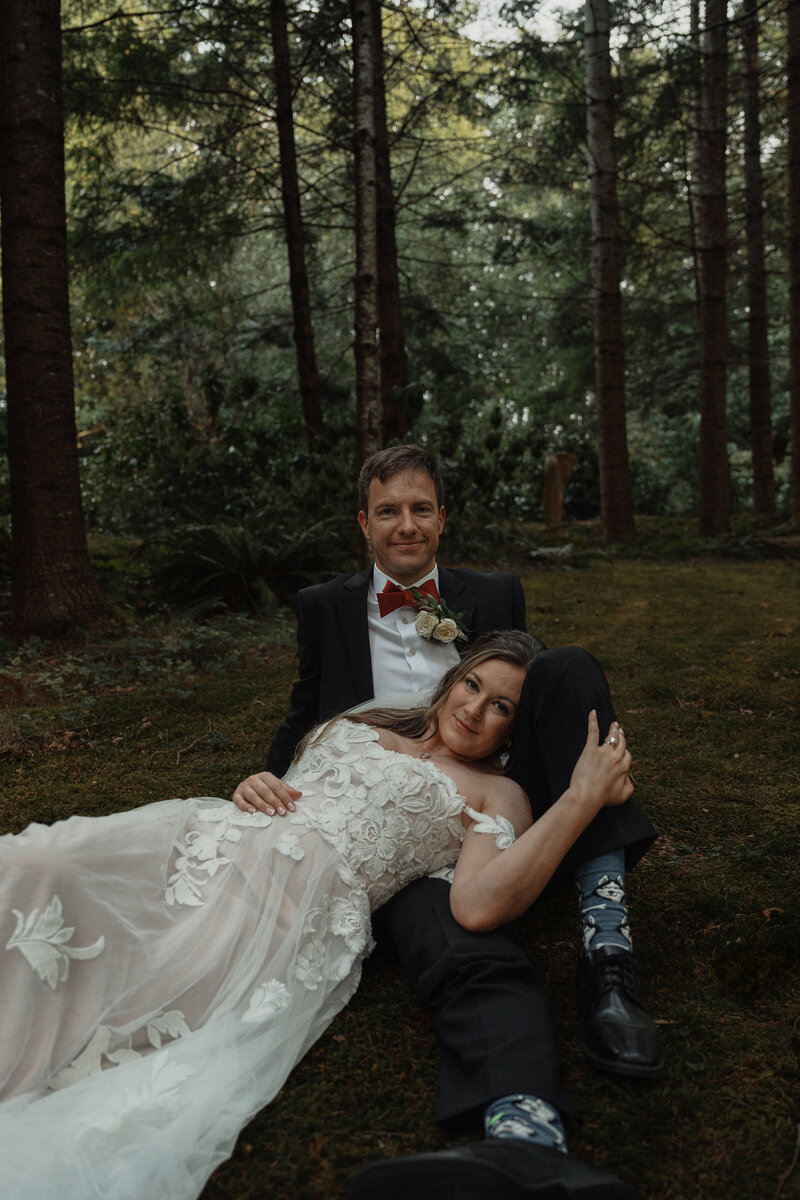 bride and groom during their wedding portraits at kitty coleman woodland gardens, Comox Valley. Wedding by Latitude 49 photography
