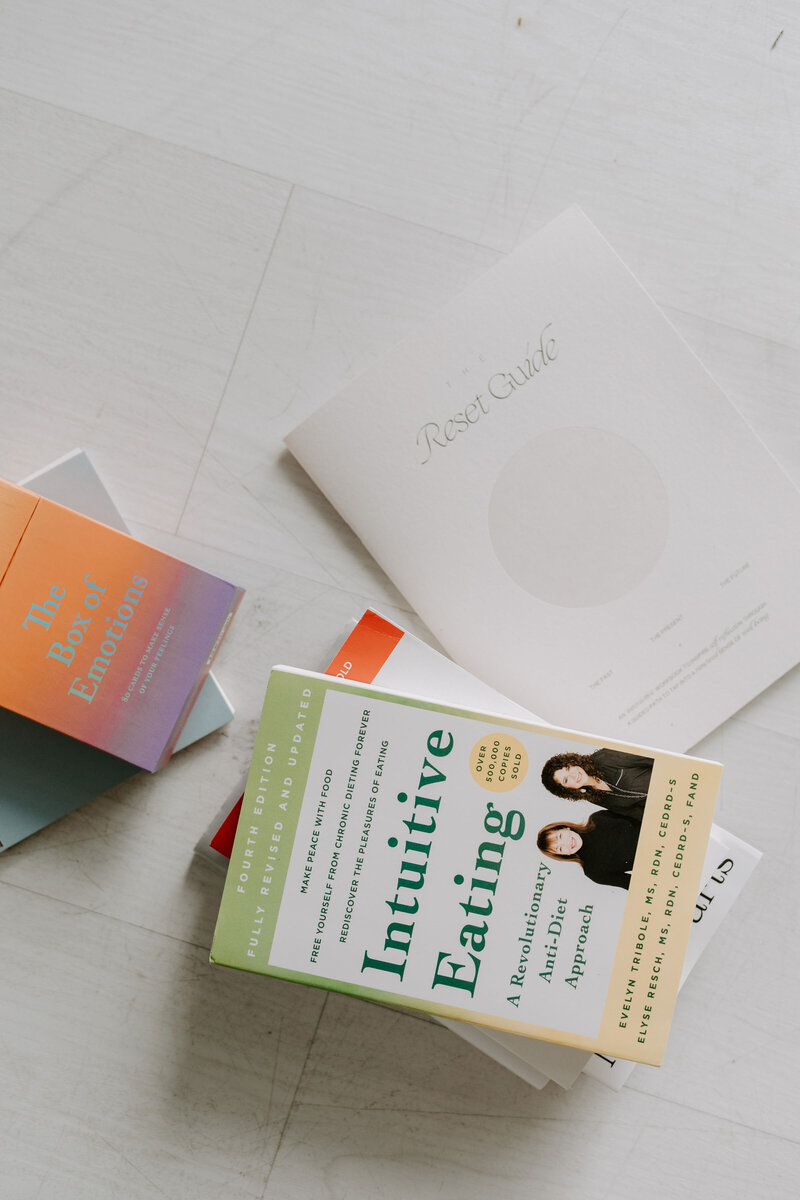 Therapist resources including a journal, emotion card deck, reflection guide, and Intuitive Eating book