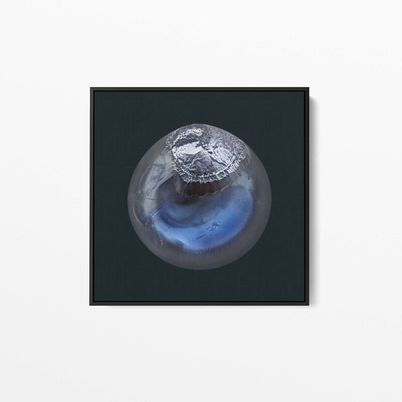 Fine Art Canvas with a black frame featuring Project Stardust micrometeorite NMM 2752 collected and photographed by Jon Larsen and Jan Braly Kihle
