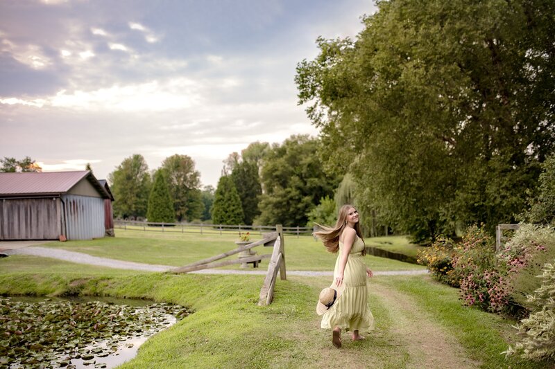 frederick-senior-girl-running-on-farm