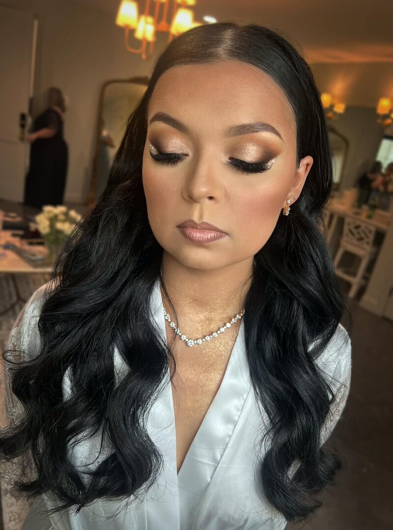 Soft glam makeup applied by a top Houston makeup artist, perfect for a refined Houston wedding and natural bride-to-be style.