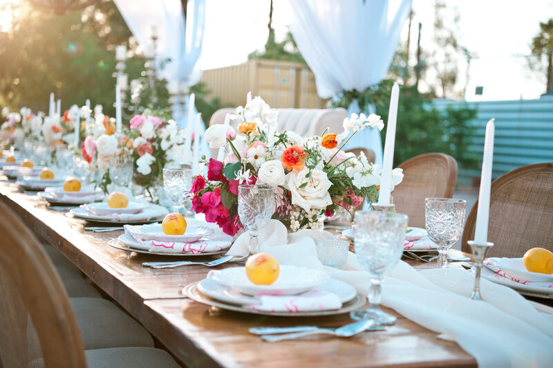 Elegant spring-inspired tablescape with crystal glassware, citrus accents, and fresh florals—photographed by MISGIF at a corporate brunch event in Phoenix, Arizona.