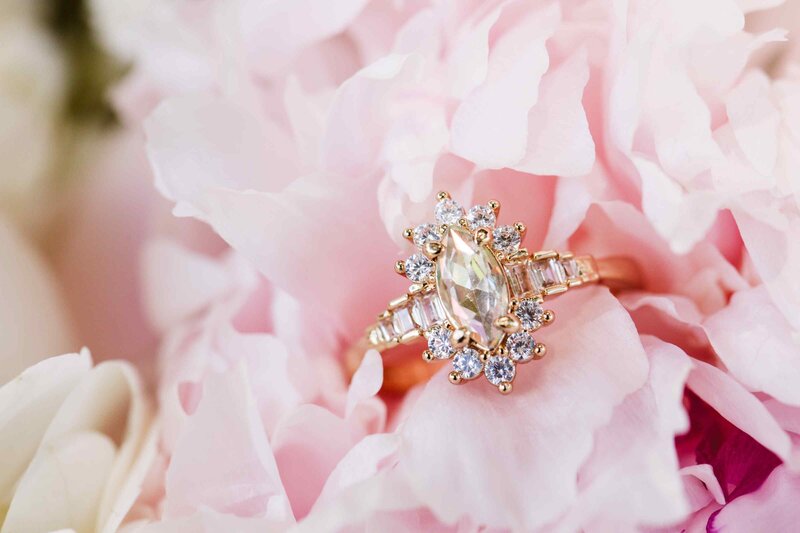 Engagement ring in a peony flower