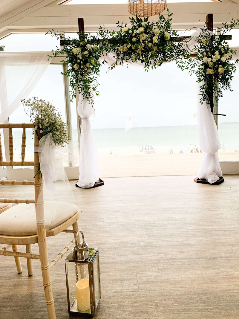 Long banqueting tables of flowers at Carbis Bay