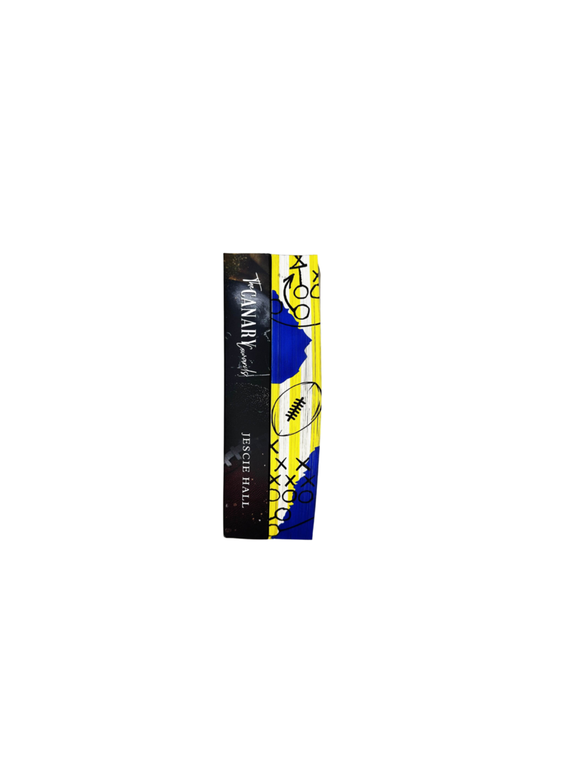 Hand-painted sprayed-edge design for The Canary Cowards by Jescie Hall from Sprayed Your Pages, with bright yellow and blue tones, football play symbols, and a bold athletic theme.