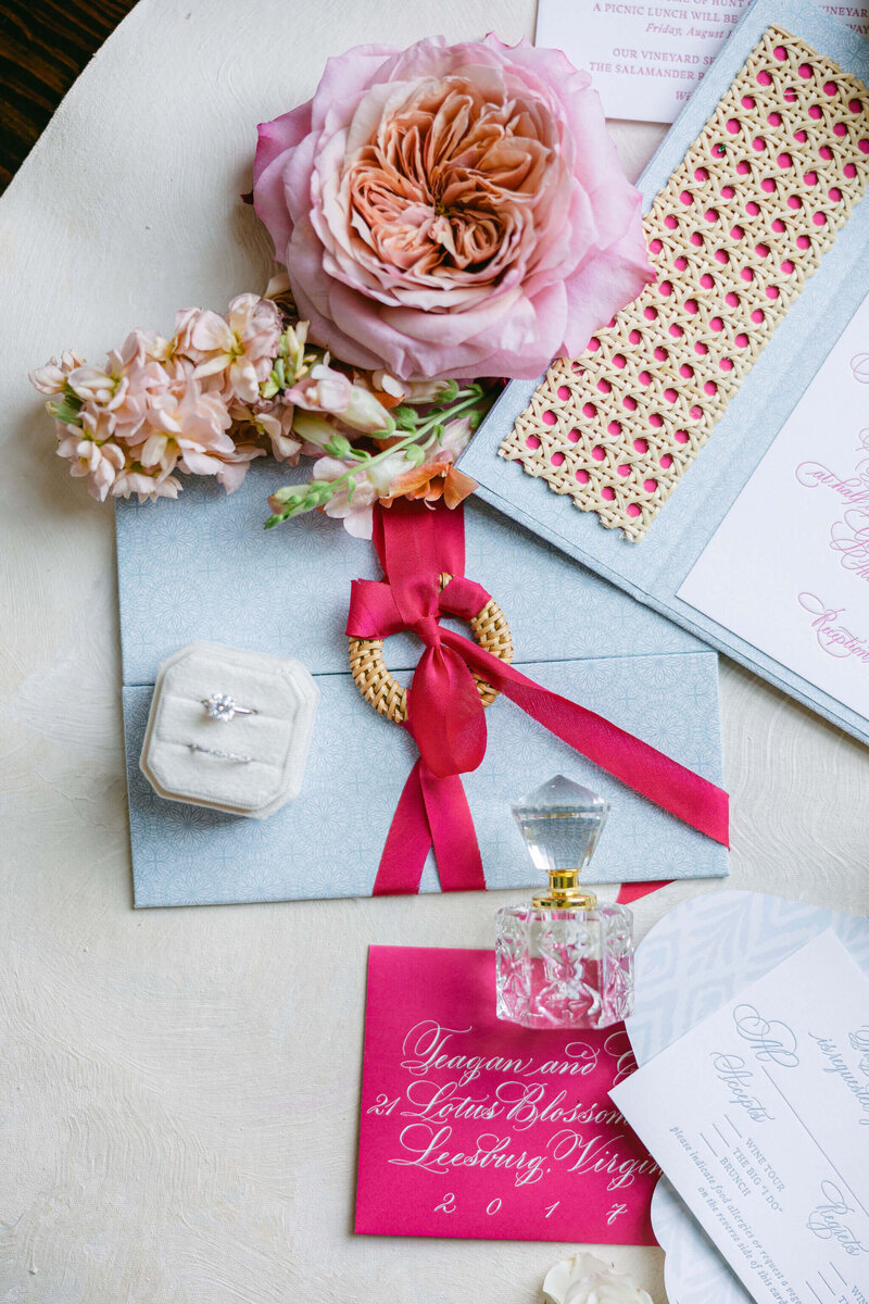 Get ready to say 'I do' with this stunning wedding invitation featuring delicate pink roses and a beautiful ring. It's time to celebrate love