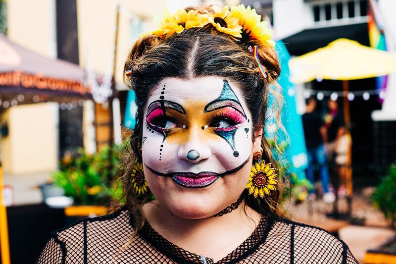 LGBTQ+ pride event dancer, actress with colorful make up