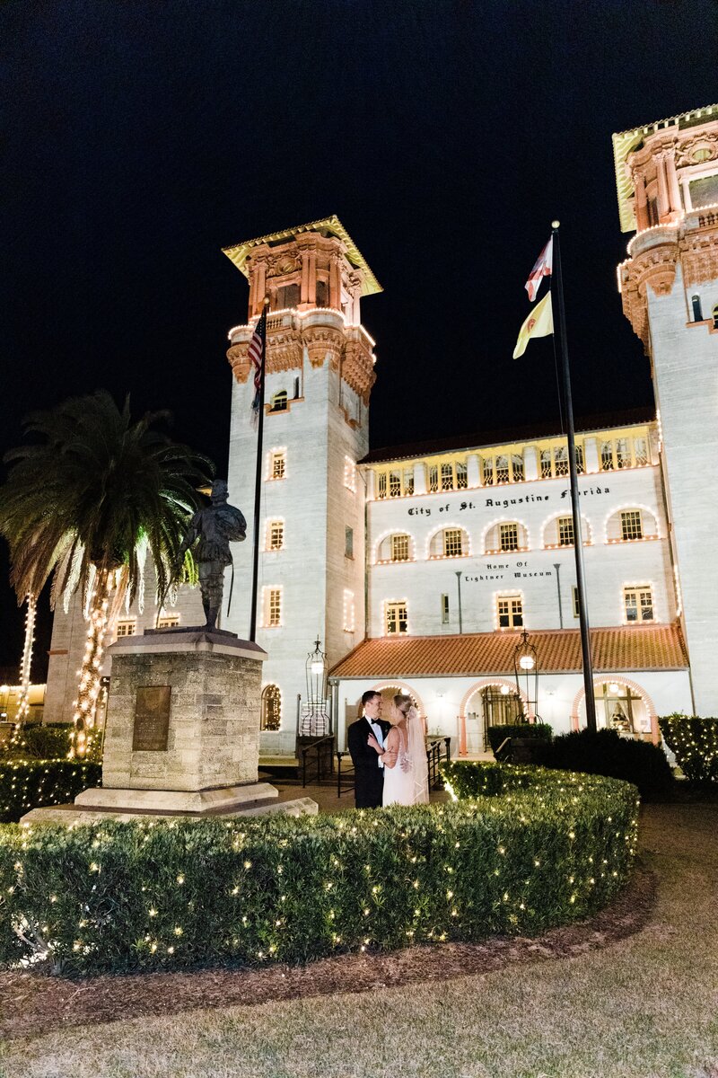 Bride and groom in front of a building in the City of St. Augustine, Florida