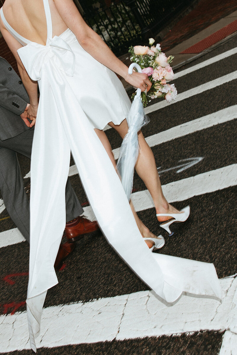 City elopement of couple on crosswalk at their city elopement