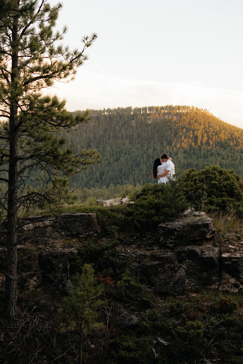 A couple kissing in the distance at Falling Rock.