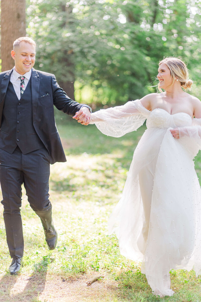 a groom dips his bride for a romantic kiss at Indie Hollow wedding venue