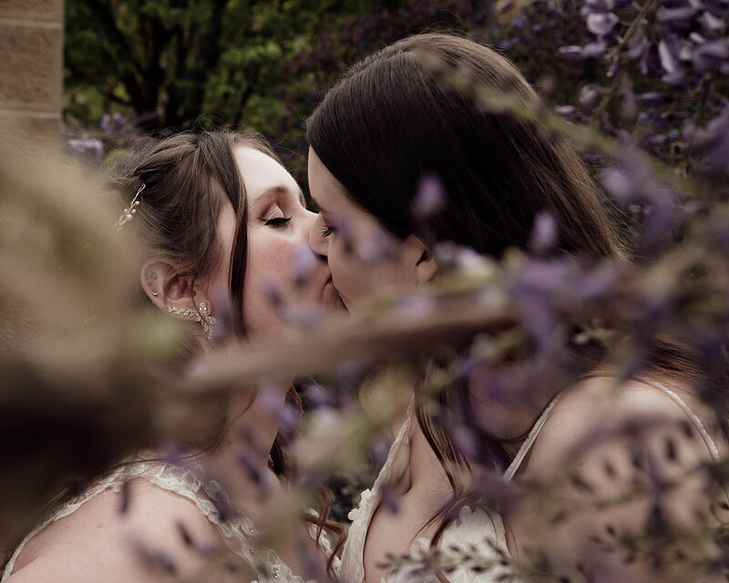 Romantic wedding photographer captures two brides kissing