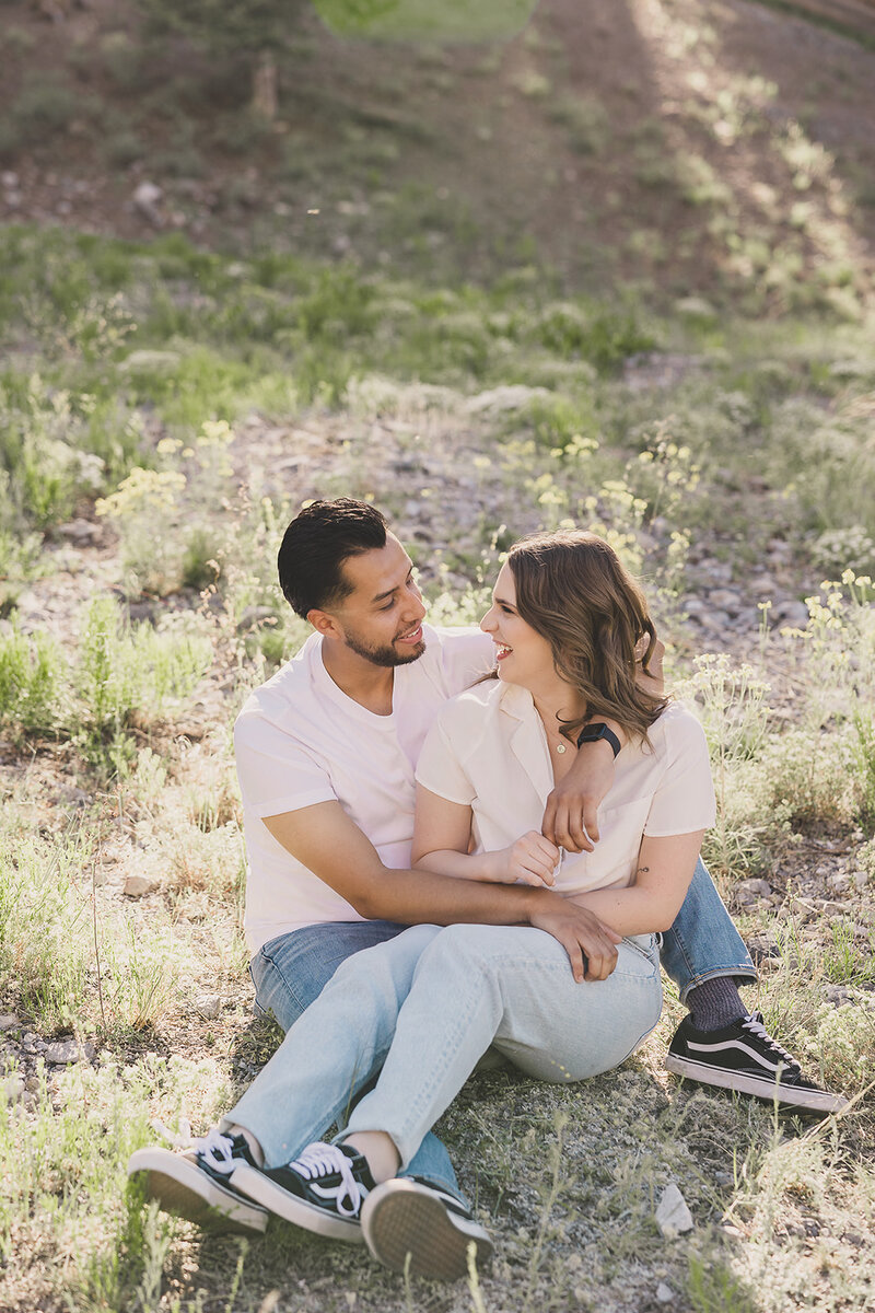 couple embraces during engagement photoshoot in las vegas