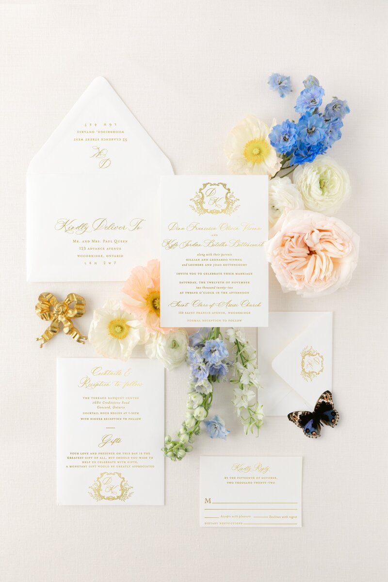 Elegant wedding invitation  with vintage monograms in gold foil