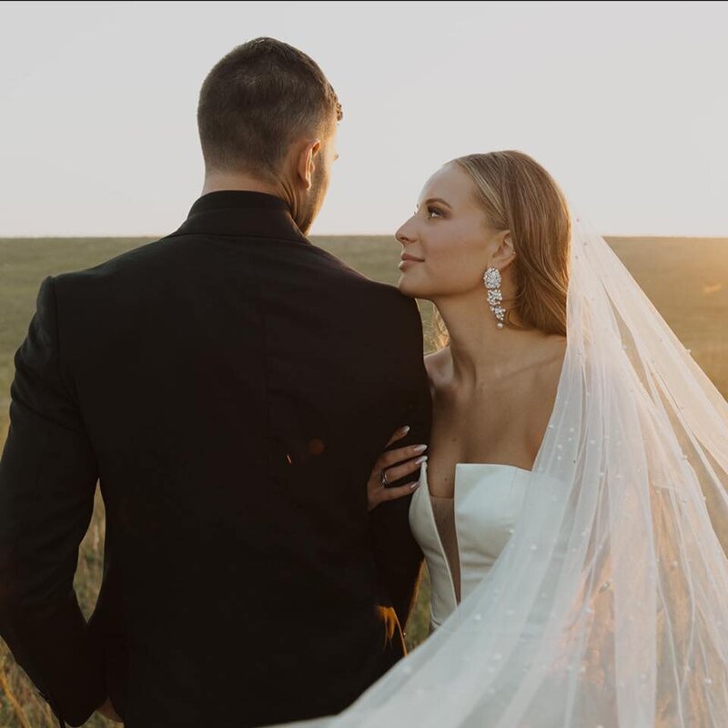A happy couple smiles for a photo at the beautiful August House Venue in Dickinson, North Dakota.