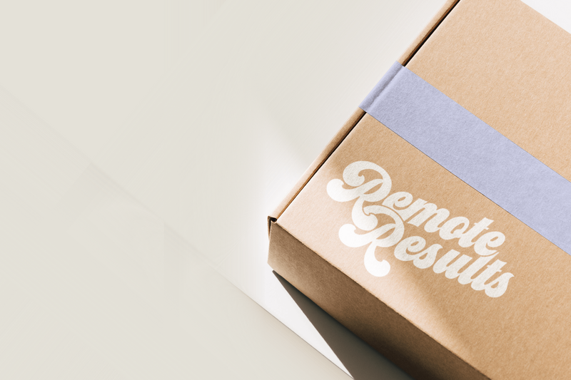 Two female business owners working on laptop and making notes