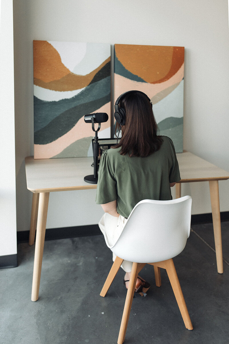 Chloe on a podcast interview after pitching herself to the press
