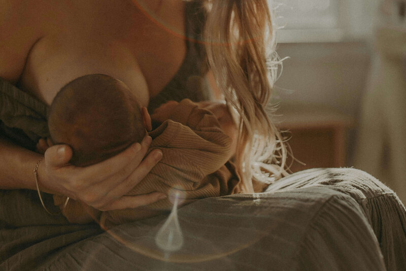 mother nursing baby