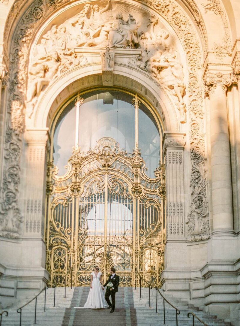a couple embracing on the Bizhakeim bridge in Paris