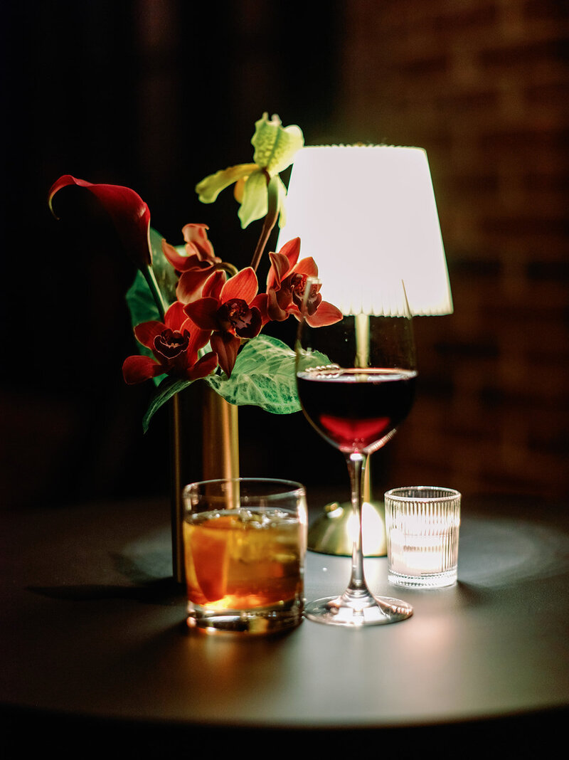 Burgundy and green modern welcome party and rehearsal dinner at Ritz-Carlton Georgetown DC