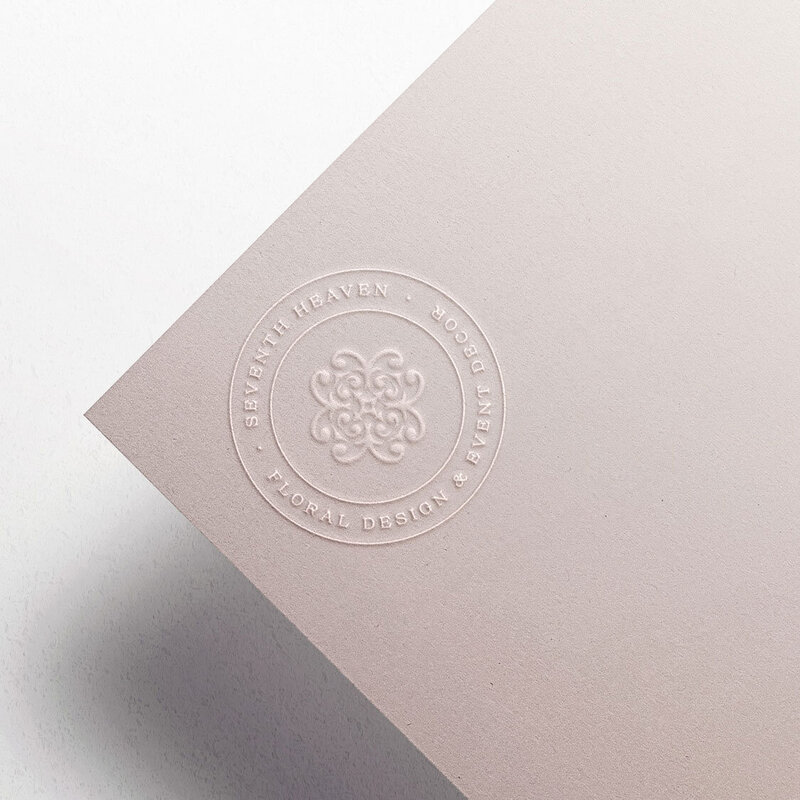 Custom emblem design for Seventh Heaven Events printed on a blush-toned card — branding by Sarah Shuttle