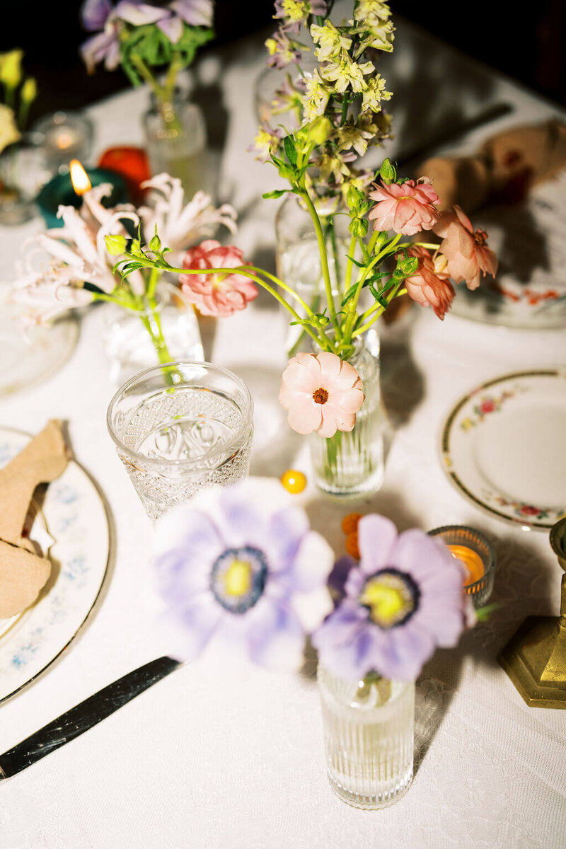 Small vase of peach colored florals by Jessamine floral and events, New Jersey and Philadelphia floral designer