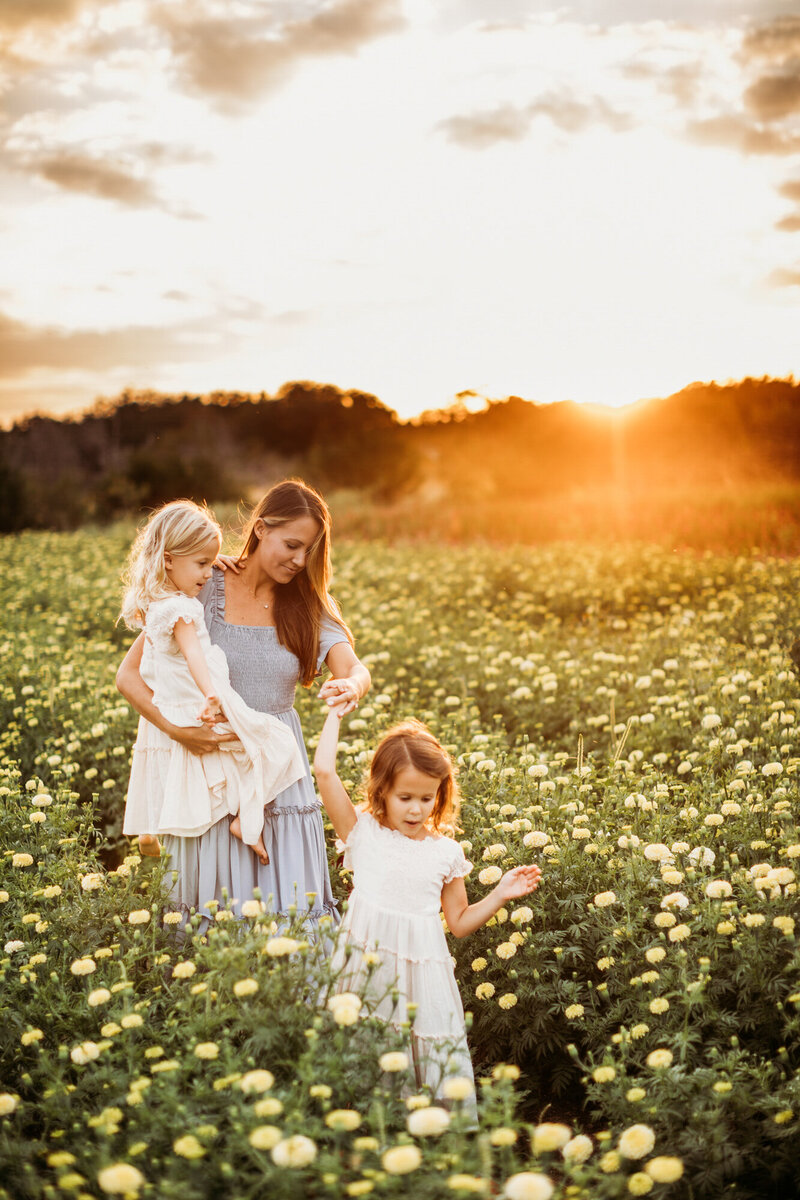 family photography session in wildflower field