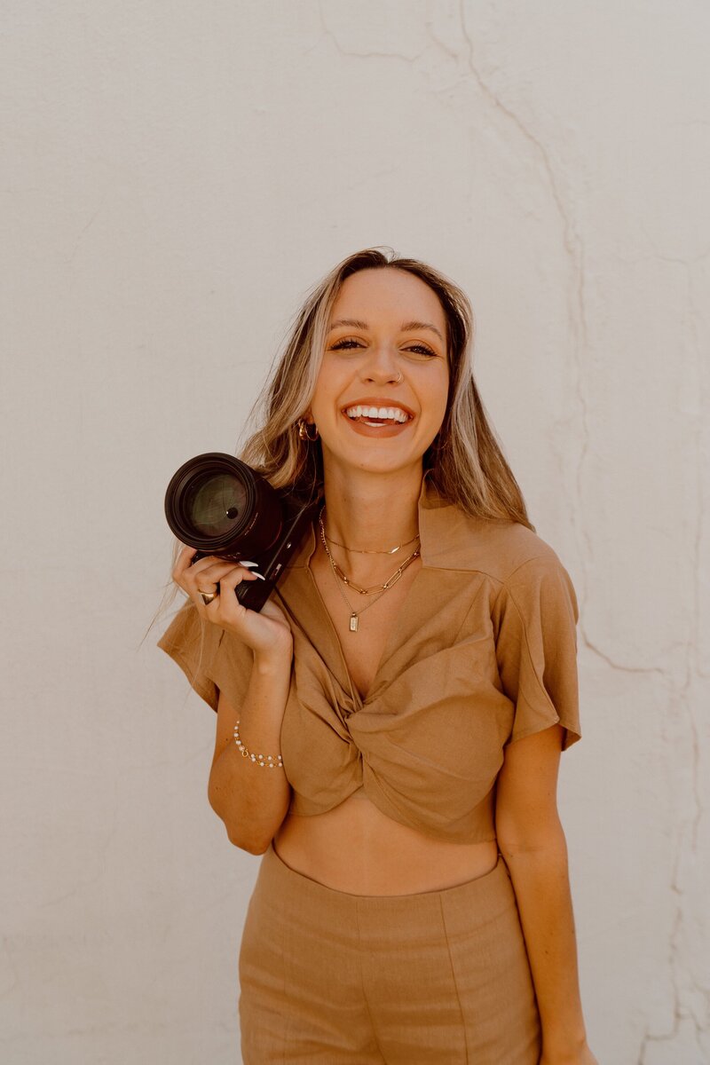 photographer smiling at the camera