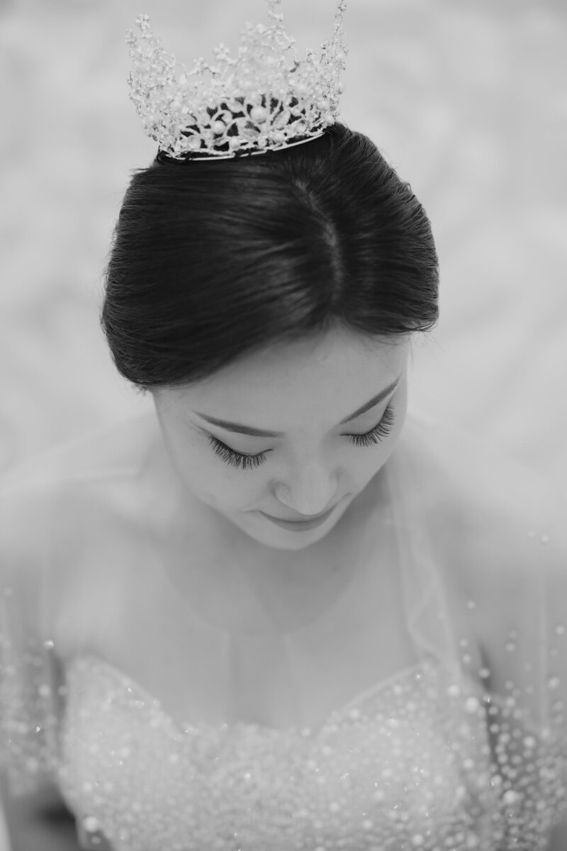 bride wearing sweetheart neckline gown and silver crown