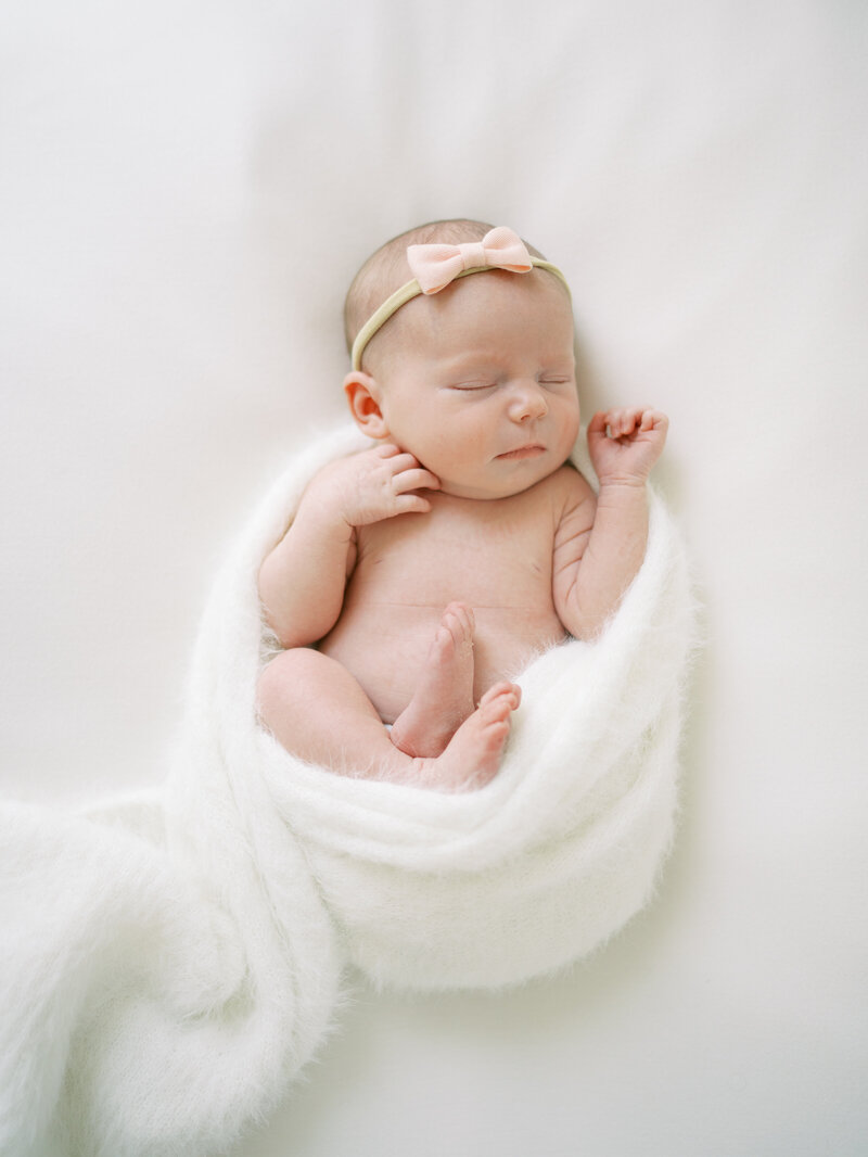 A stunning individual photo during an intimate boudoir inspired maternity session.