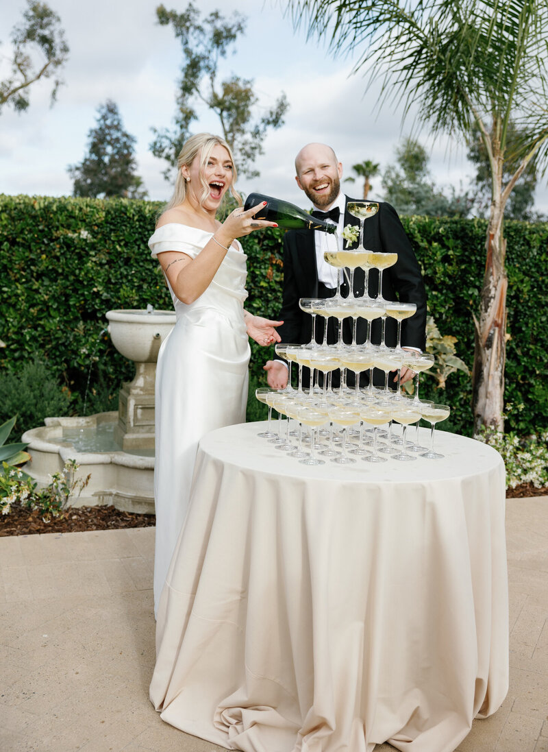 bride in strapless white wedding gown with silver belt