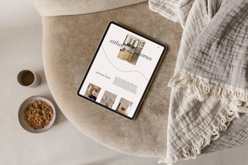 Esther Homes interior designer tablet mockup on couch, minimalistic landing page design