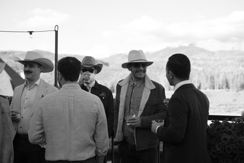 Guests at Devil's Thumb Ranch enjoying a wedding welcome dinner 