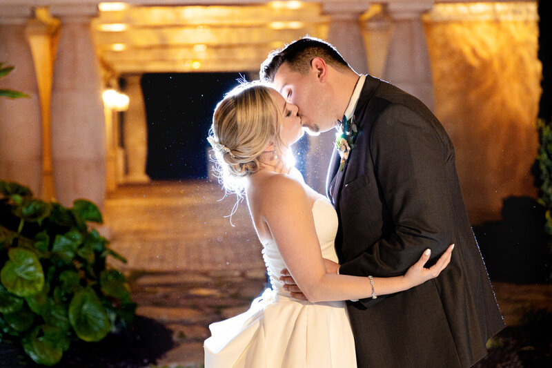 A couple shares a kiss on their wedding day at 21 Main Events in Myrtle Beach, SC