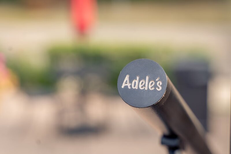 Close-up view of custom 3D printed rail cap for Adele's Frozen Custard. 