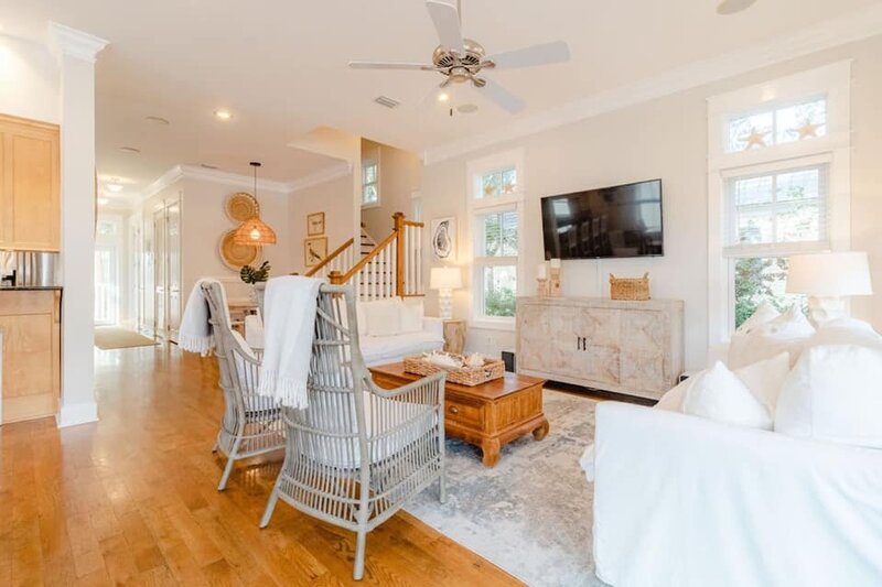 living room with bamboo chairs and  brown coffee table