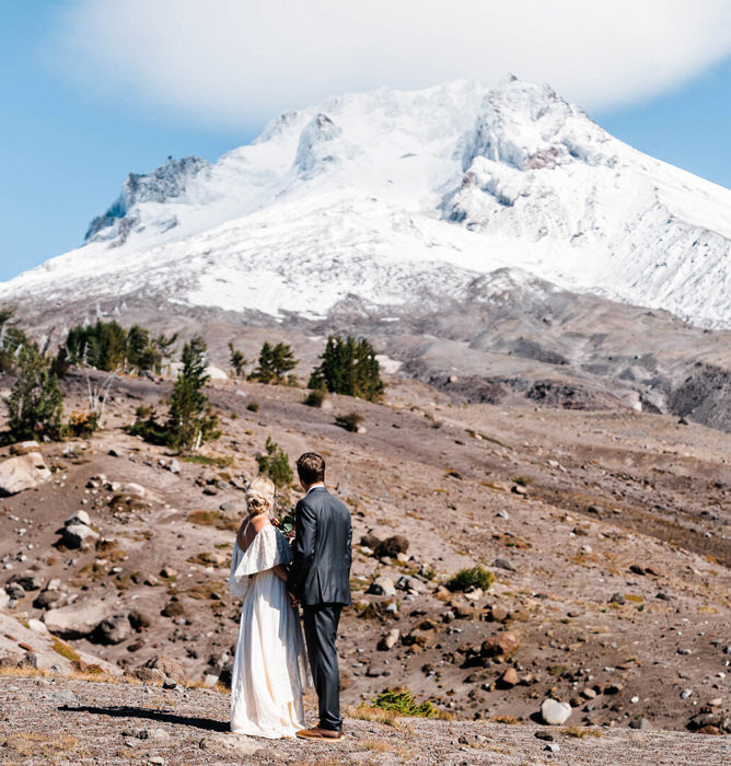 a timberline lodge elopement during the first snow of winter photographed by amy galbraith