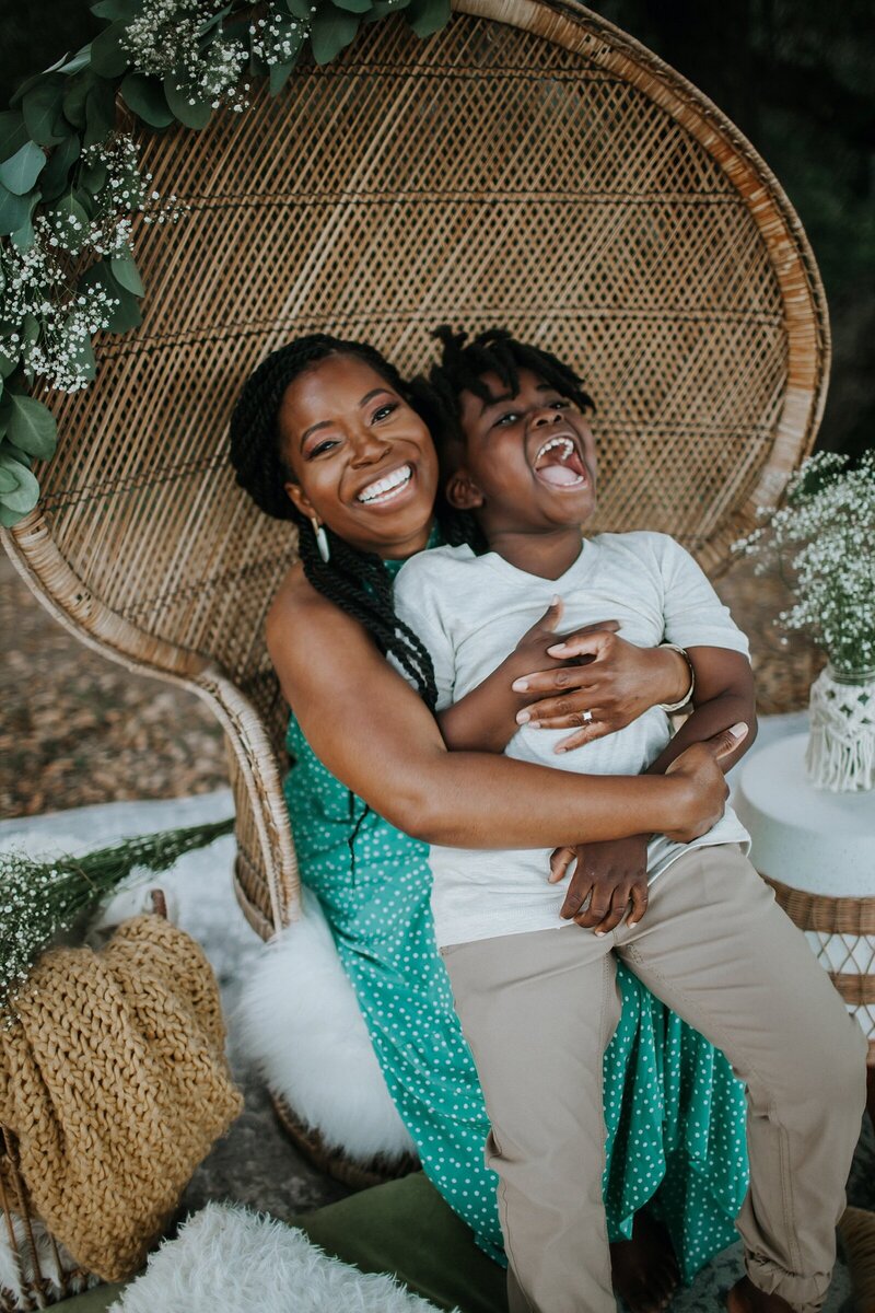 Yvette and Uriah Henry being tickled.