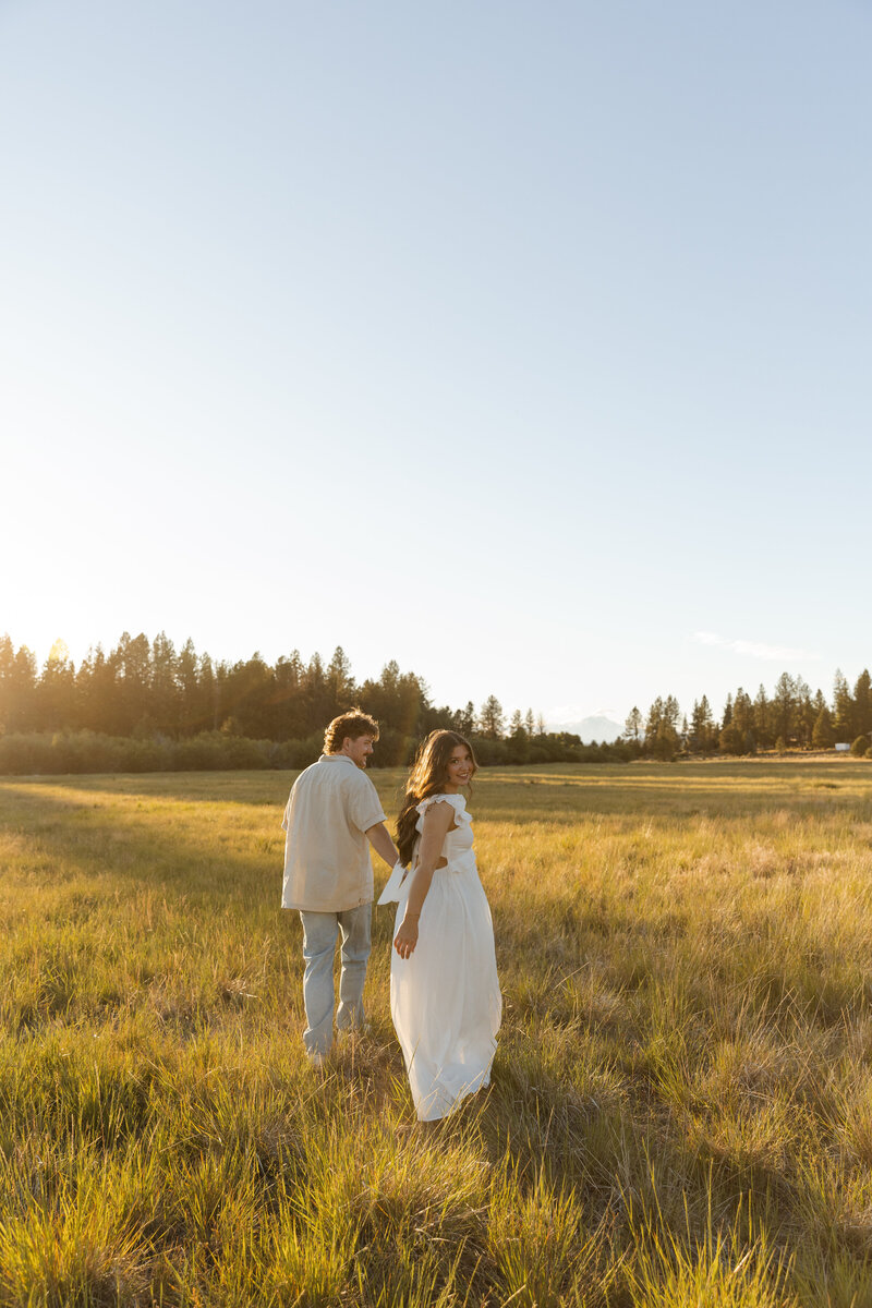 couple poses on doorsteps for couples shoot in mesa arizona