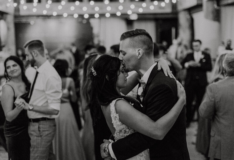 black and white photo of couple embracing Oregon Coast Elopement and Wedding Photographer